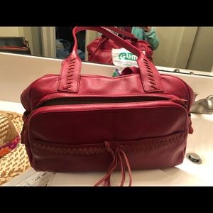 Big red weekender bag